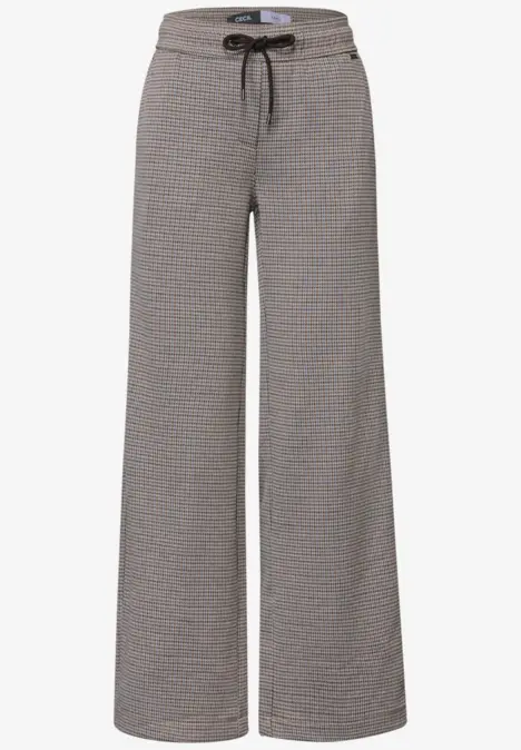Graue, weit geschnittene Loungehose mit dezentem Muster und Kordelzug an der Taille.
