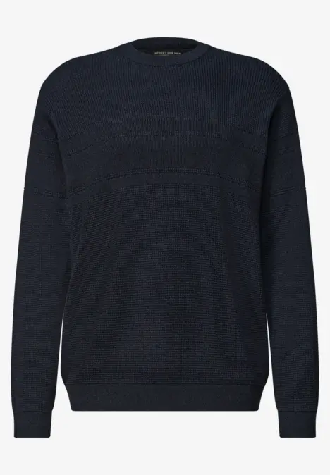 Donkerblauwe effen trui met ronde hals, lange mouwen en geribbelde boorden voor een strakke look.