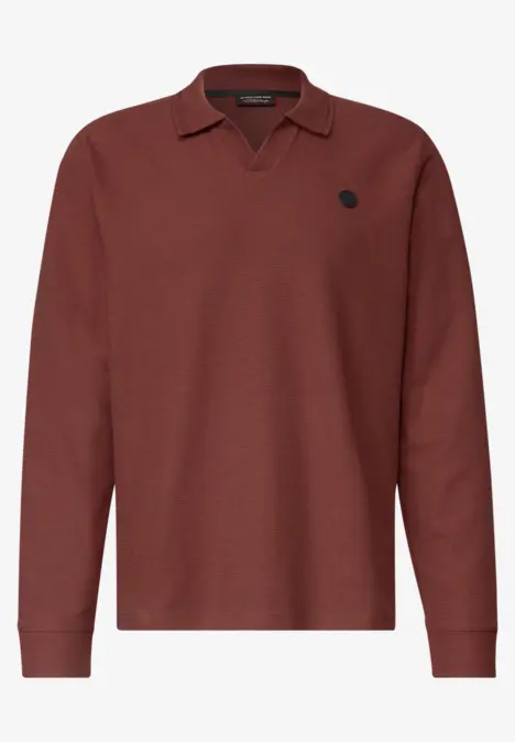 Bordeauxrood poloshirt met lange mouwen en klein logo op de borst.