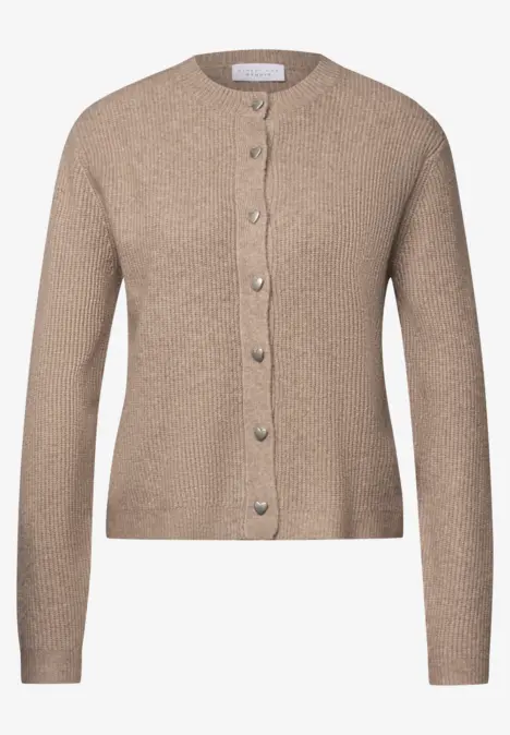 Cardigan en maille beige à col rond, manches longues et fermeture à boutons.