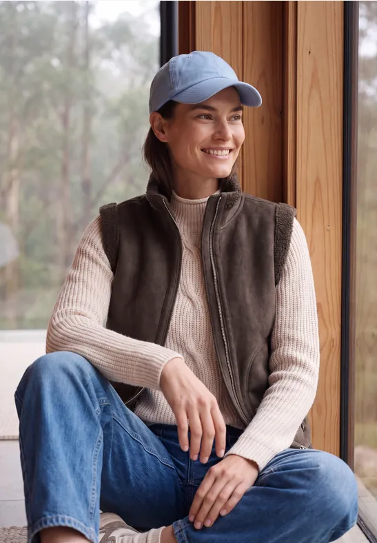 Bodywarmer van velours met teddyaccenten