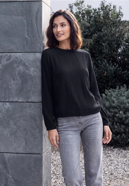 Blouse met lange mouwen en gesmokte details